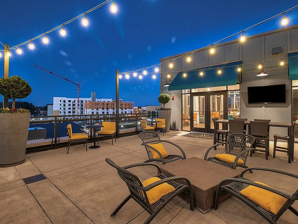 Our outdoor pavilion with TVs and dining areas
