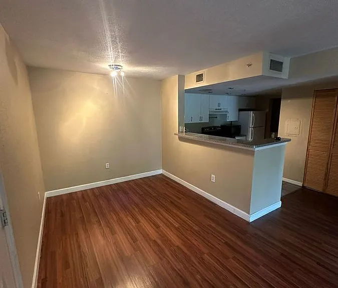 5035 Wiles Rd #203 — Photo 31