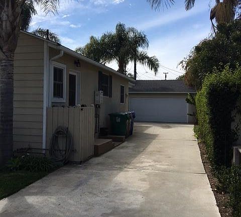 Newer garage door with remotes, long private driveway