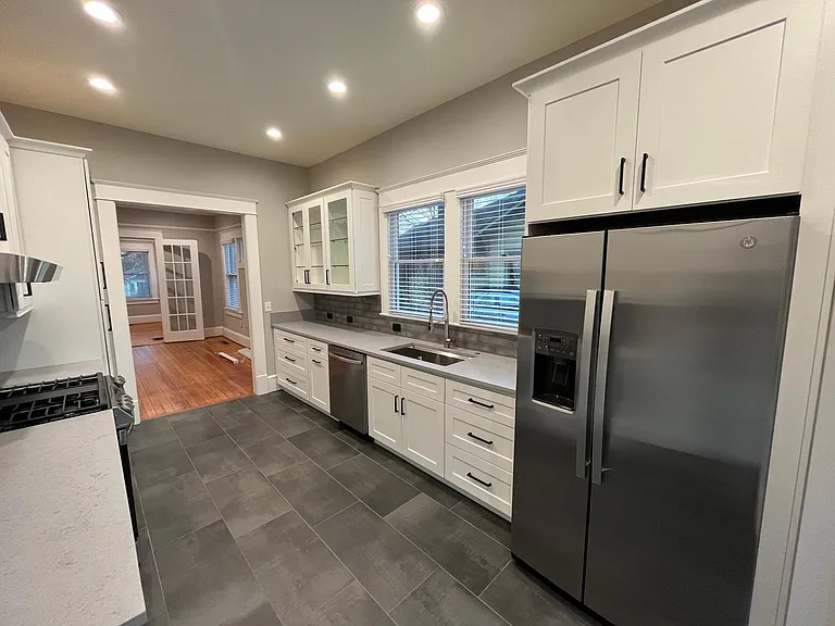 All new stainless appliances and quartz countertops