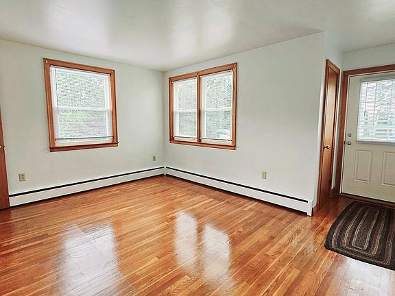 Nice size living room. Nice light. Beautiful floors.