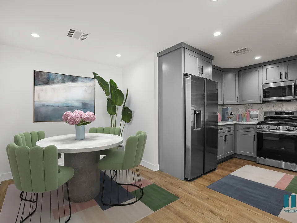 Dining Room and Kitchen with Energy-Efficient Appliances and Ample Cabinet Storage