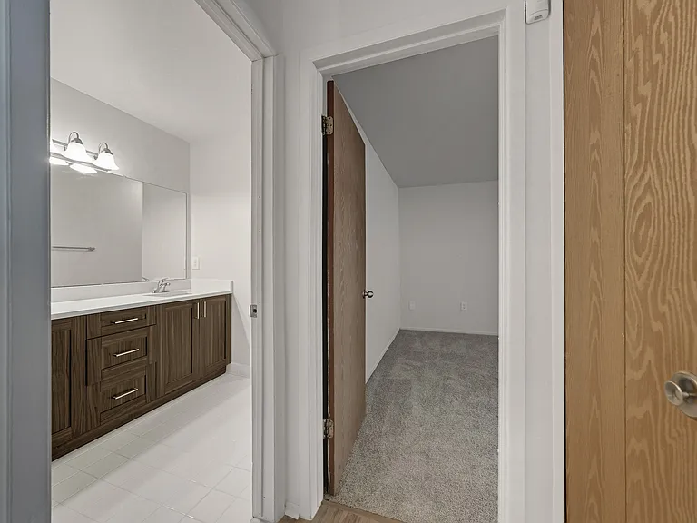 Roomy bathroom and bedroom at Franklin River Apartments in Southfield