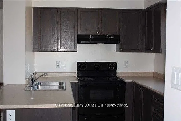 5625 Oscar Peterson Blvd #16 — Photo 1