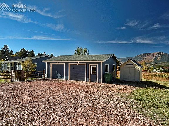 Two-car detached garage and storage shed