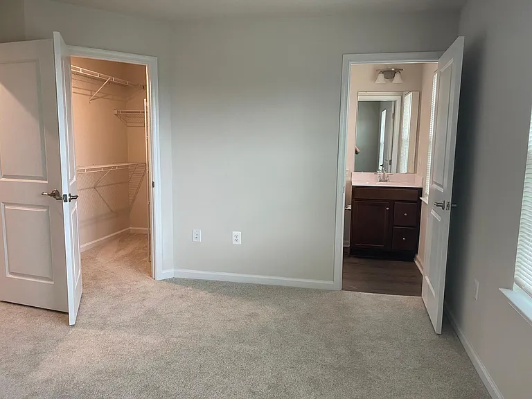 Master bedroom with full bath and walk in closet