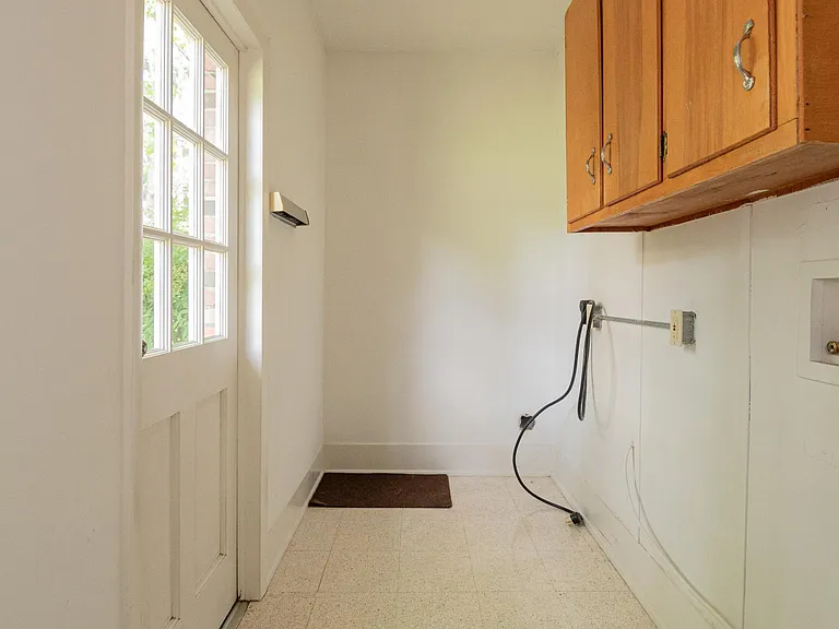 LAUNDRY ROOM WASHER AND ELECTRIC DRYER (BY TENANT)