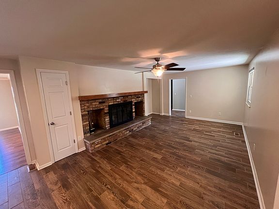 Living room with working wood fireplace.