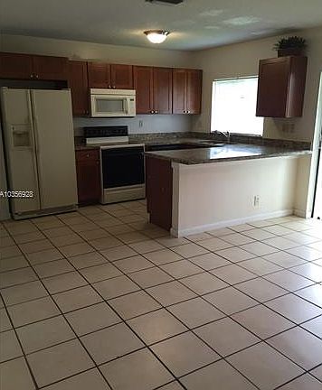 5th image of 704 NW 132nd Ter