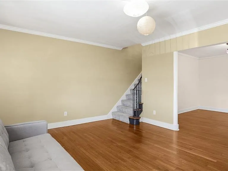 Living room and stairs to 2nd floor