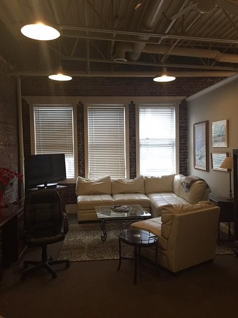 Industrial ceilings, brick exposed walls