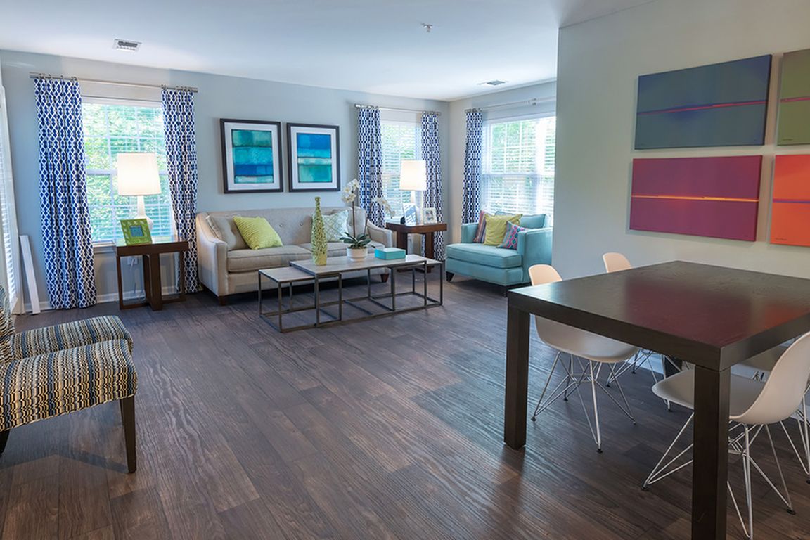 Sustainable wood plank-style flooring throughout
