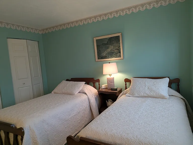 guest bedroom with double closet