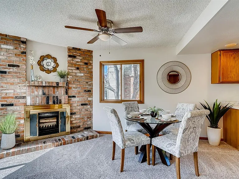 Dining area adjacent to kitchen. *Flooring recently updated to vinyl-see later pictures*