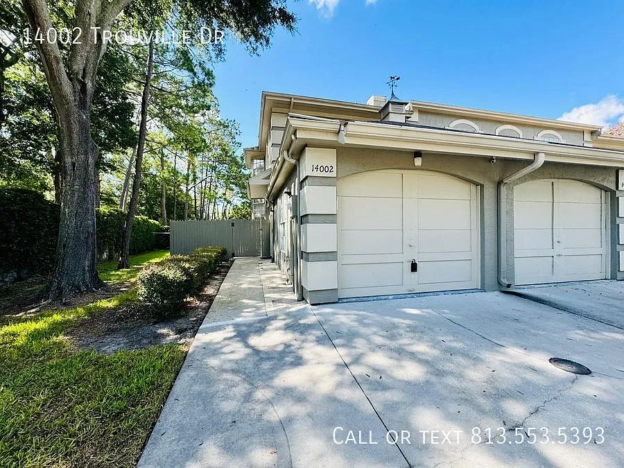 Welcome to 14002 Trouville Dr, Tampa, FL 33624! Stunning 2BR Townhome in Chardonnay Carrollwood V... — Photo 2