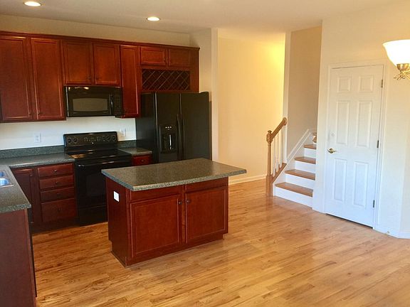 Kitchen looking upstairs and to living room