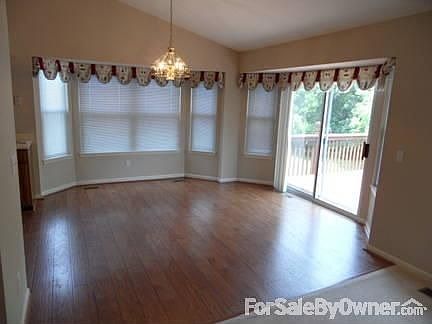 Dining Room and Deck Door
						:
						Viewed from Great Room.