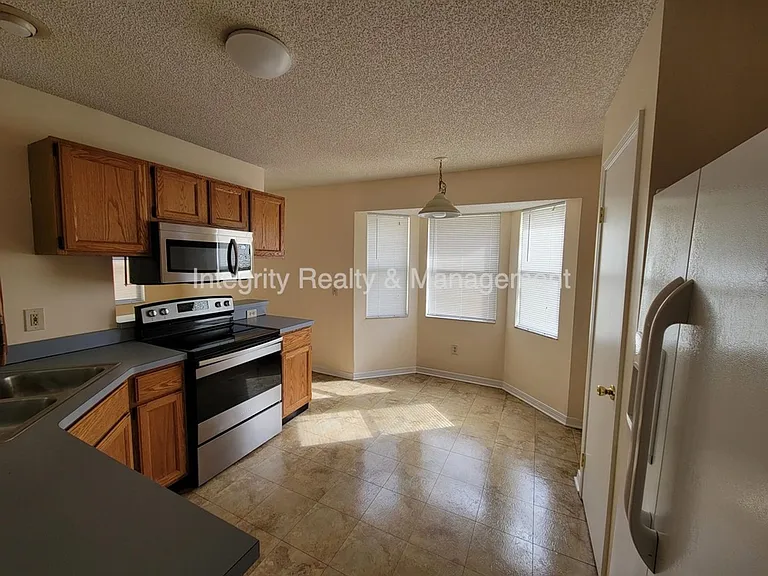 7519 Allspice Cir N — Photo 17