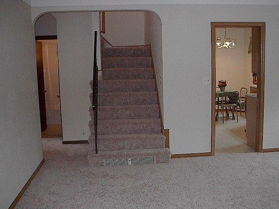 Open stairway leading to 2 upper level Bedrooms and lots of storage. 