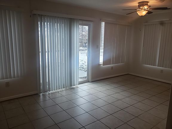 Sun room with sliding door to back yard.