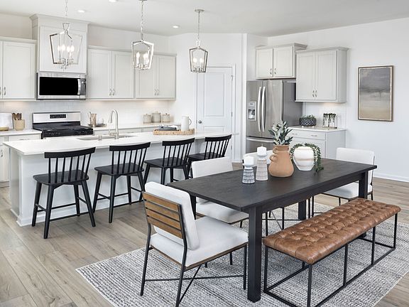 Sequoia model dining area and kitchen.