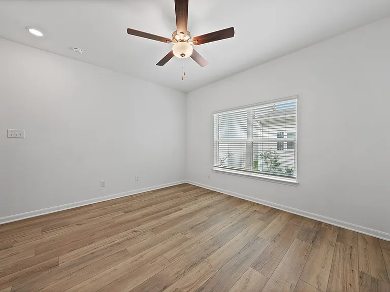 Family room with vinyl flooring.