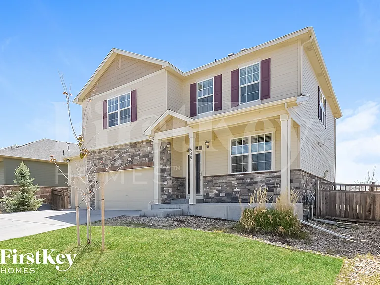 6481 N Dunkirk Ct — Photo 2