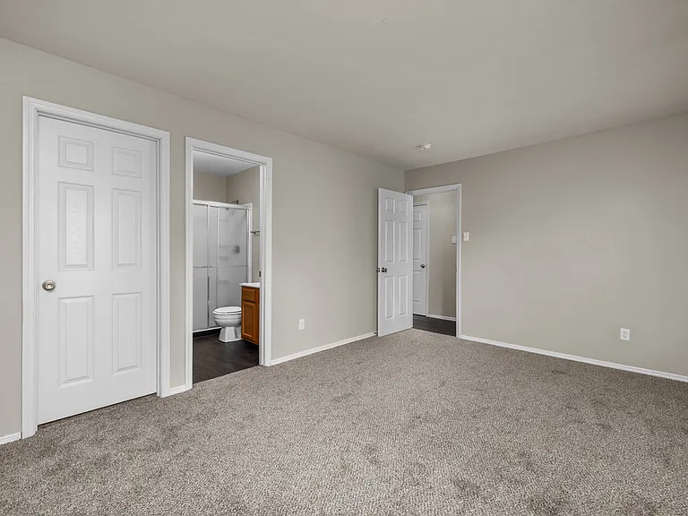 Two Bedroom Garden Partial Remodel with Fireplace | Bedroom with En Suite Bathroom and Walk In Closet Two Bedroom Garden Partial Remodel with Fireplace | Bedroom with En Suite Bathroom and Walk In Closet