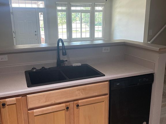 New fridge and stove in kitchen