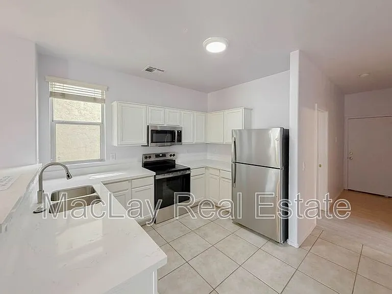 5216 W Albeniz Pl — Photo 5