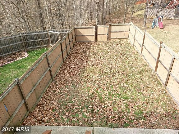 Spacious Fenced in Backyard Backing to Woods