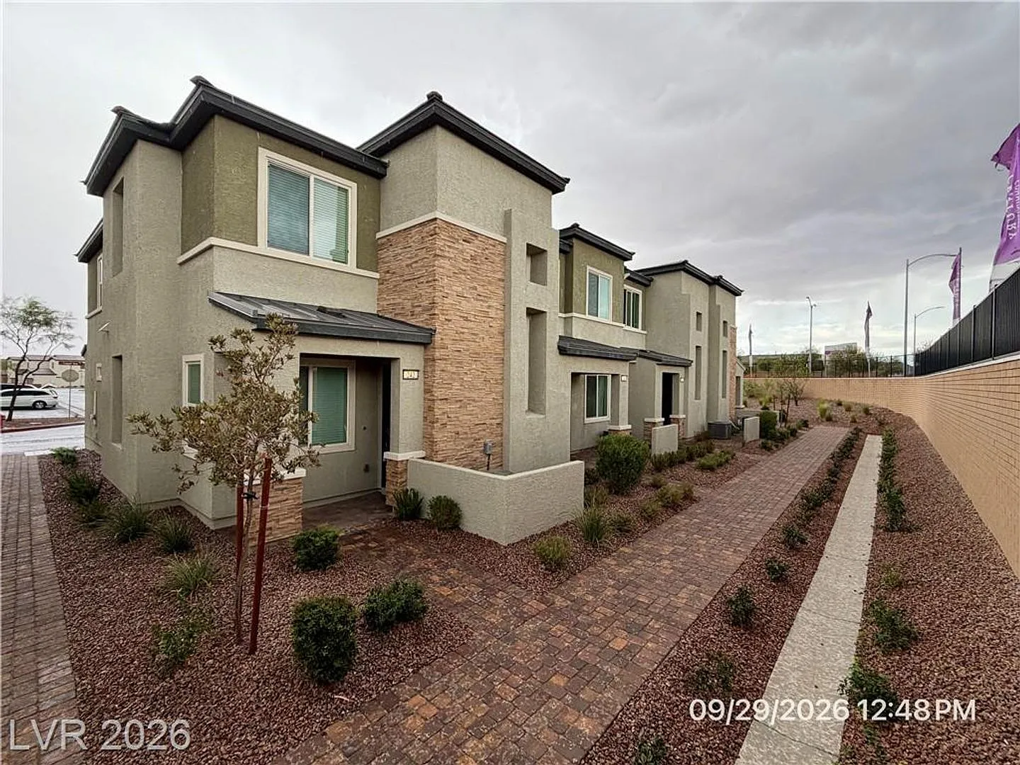 Brand-New 3-Bedroom Cadence Townhome with End-Unit Privacy — Photo 1