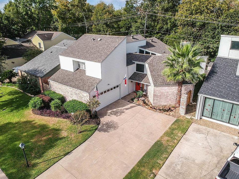 This beautiful contemporary is located on a quiet street with a private park like setting in the back yard. The house was practically rebuilt from the inside out and outside having re-framed when necessary using modern technology building materials. 