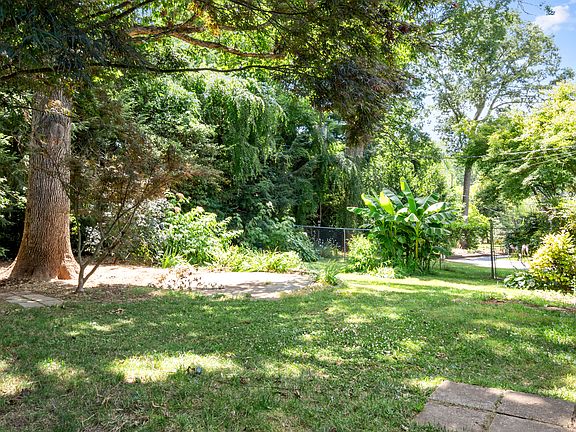 Tree-shaded, fenced back yard