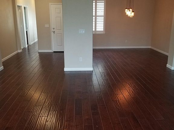 Living room to Entry way and Formal Dining Room