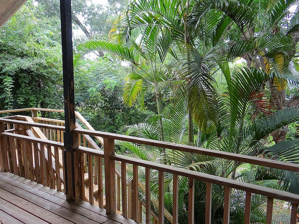 Staircase leading to the backyard from the upper deck...