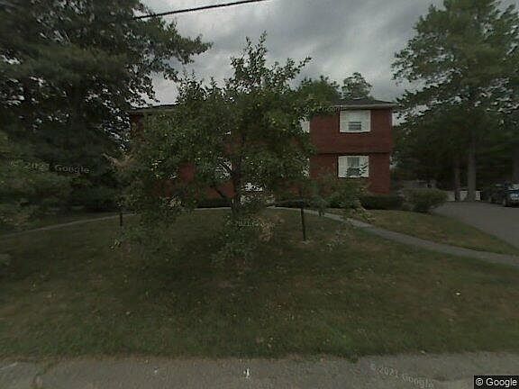 Apple trees in front of house