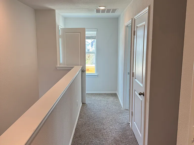 Upstairs Main Hallway:
Guest Bathroom Entry
Two Storage Closets:
Middle Right 
End of Hallway