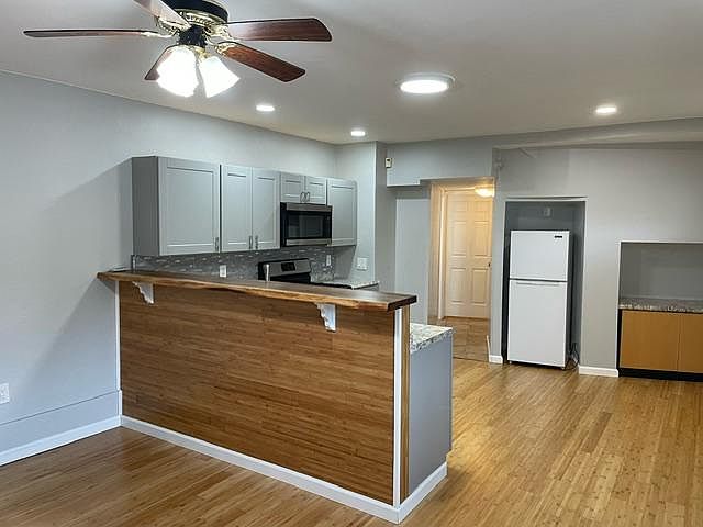 Kitchen looking to Garage exit