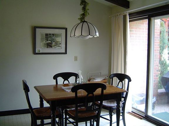 casual eating area opens to brick patio