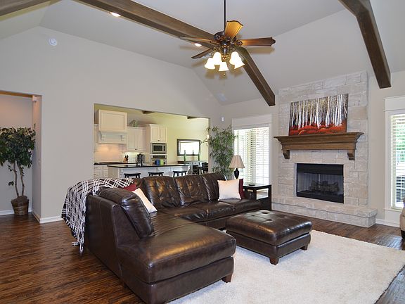 Relaxation made easy by the fireplace