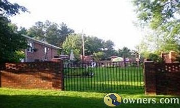 Brick fence all around back yard and pool a