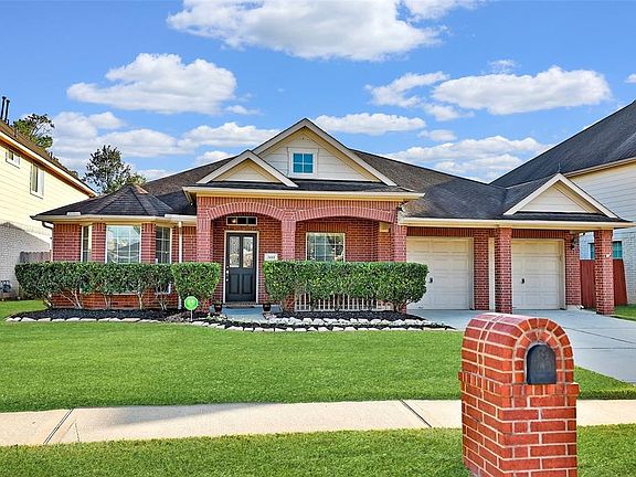 Home has sprinkler system covering front & back yards.