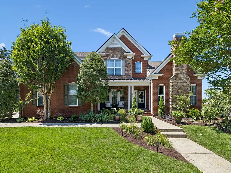 Custom landscaping and a lawn irrigation system are just a few of the thoughtful improvements, enhancing both curb appeal and ease of maintenance.