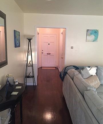 Living room view of the front door.