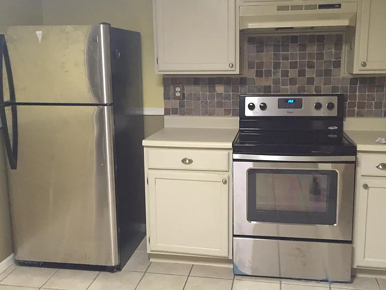Kitchen..new stainless steel fridge/stove