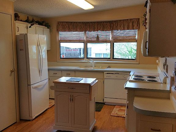 Large Bay Window Above Kitchen Sink