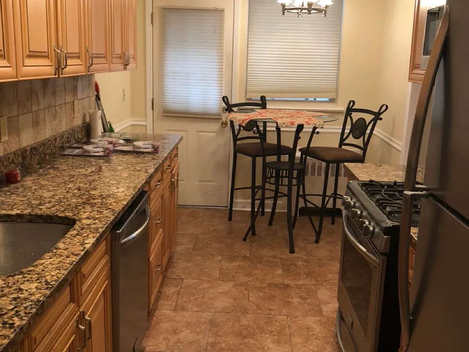 Kitchen with granite countertops.