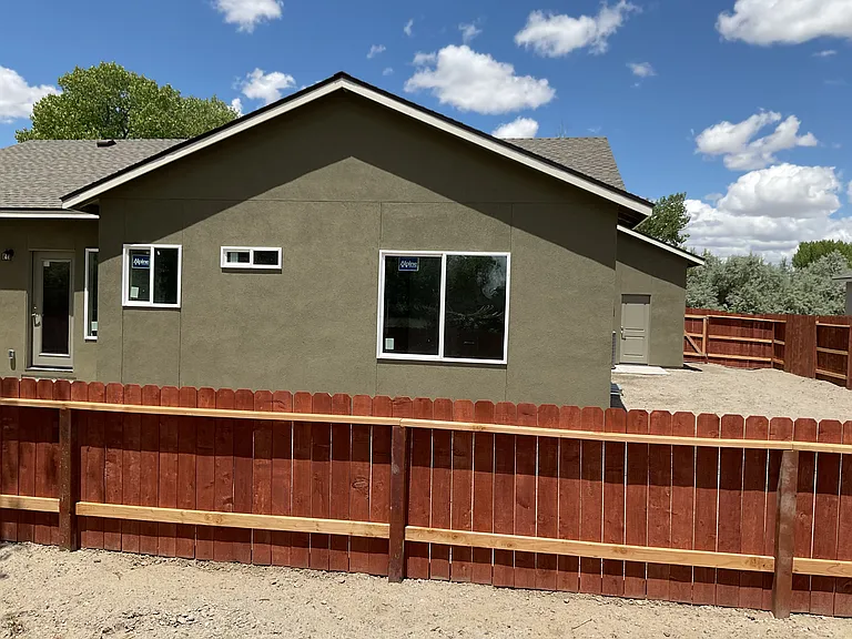 Back view. Property is on open green space