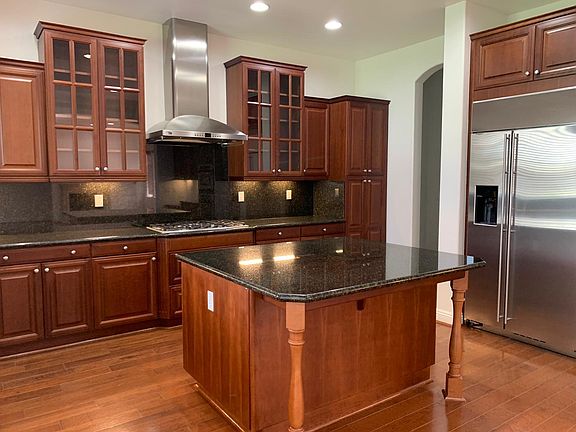 Kitchen with stainless steel appliances and granite countertops